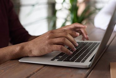 person-using-macbook Person Using Macbook